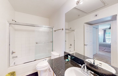 Orlando Apartment | Updated apartment with community pool & gym - balcony, W/D, and great location