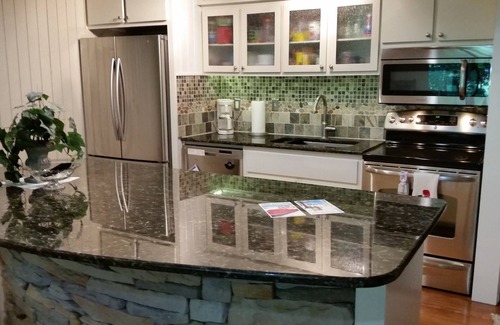Bellaire Condo | Updated Condo @ Schuss Mt., Pool outside the front door and golf/skiing in back