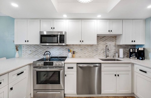 New Smyrna Beach Condo | Updated direct oceanfront condo with a private balcony, heated pool, and beach access