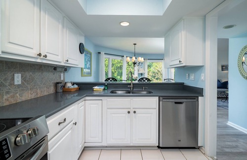 Spinnaker Beachhouses House | Updated Family Spinnaker! Easy Walk to Pelican Beach, Pools, Golf! Amenity Cards!