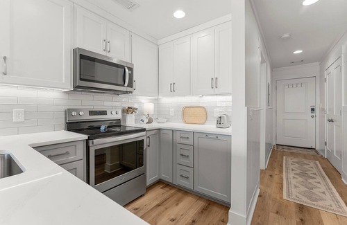 Fort Bay Condo | Updated Latitude 29 #34 Beachfront w/Pool, Hot Tub & Grills! Free Golf & Tix!