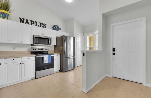 Ole Condo | Updated modern 3rd floor Lely Resort condo overlooking tropical preserve!