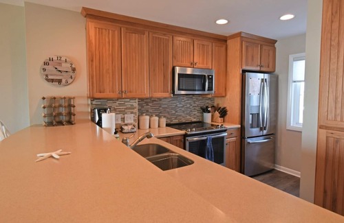 Kure Beach Condo | Updated Oceanfront condo with covered deck, indoor and outdoor pools.