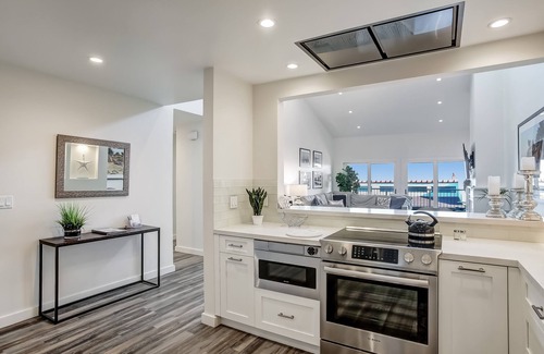 East Mesa Condo | Updated Penthouse! Steps from the sand at Leadbetter Beach, pool, spa, BBQ and more!