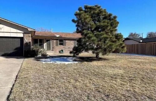 Guymon House | Updated three bedroom home across from park