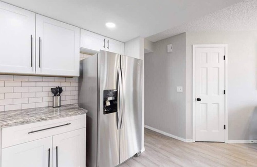 Aurora Hills House | Updated Two + loft Bed with Three King Beds, Loft & Two Baths, Corporate Housing