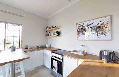 Merrivale Apartment | Upmarket off grid cottage on organic farm in secure estate