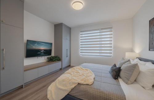 West Hillhurst House | Upper and Lower, Great for Large Families, Fenced Yard