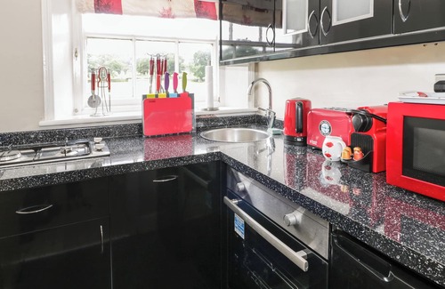 Hendrerwydd Cottage | UPPER GARDENER'S COTTAGE, pet friendly, with hot tub in Denbigh