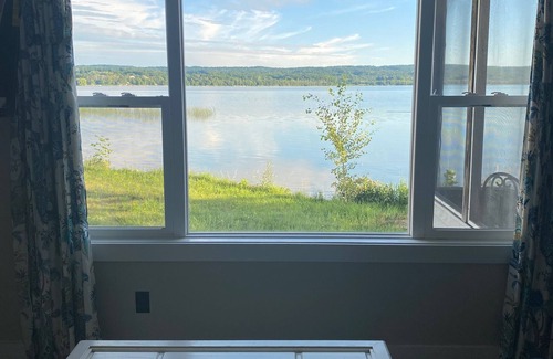 Frankfort Cottage | Upper Herring Lakefront Cottage #1, AC, Newly Remodeled, SUPs, Kayaks, Rowboats