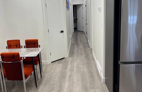 St. James Apartment | Upper Suite Family Haven - 6 minutes drive from the Airport, Close to Everything