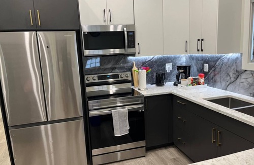 St. James Apartment | Upper Suite Family Haven - 6 minutes drive from the Airport, Close to Everything