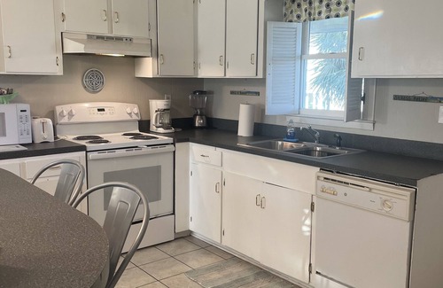 Holden Beach House | Upper unit canal home. Short walk to Holden Beach. Excellent location!