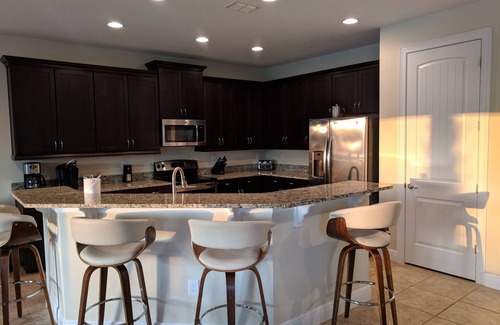 Reunion House | Upscale 6 Bedroom with Panoramic Golf Views in Reunion Florida!