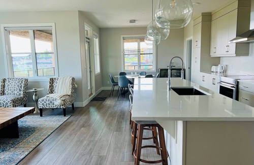 Southwest Calgary Condo | Upscale luxury 2 bed plus office with panoramic views of the rolling foothills!