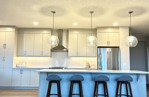 Southwest Calgary Condo | Upscale luxury 2 bed plus office with panoramic views of the rolling foothills!