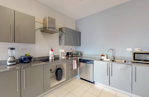 Barrio Santa Lucia Apartment | Upscale, Modern Condo with Ocean Views, Shared Pool, and WiFI
