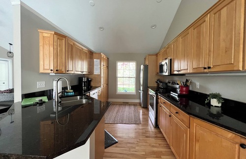 Fennville House | Upscale Picturesque Hideaway. Fenced Yard, Hot tub, Firepit and Game Room.