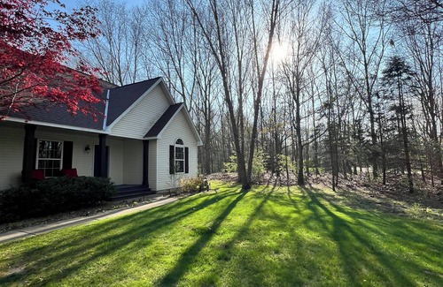 Fennville House | Upscale Picturesque Hideaway. Fenced Yard, Hot tub, Firepit and Game Room.