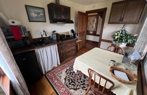 Beverly Apartment | Upstairs Historic 1 Bedroom 1 Bath Suite with Mini-Kitchen, Porch & River Views
