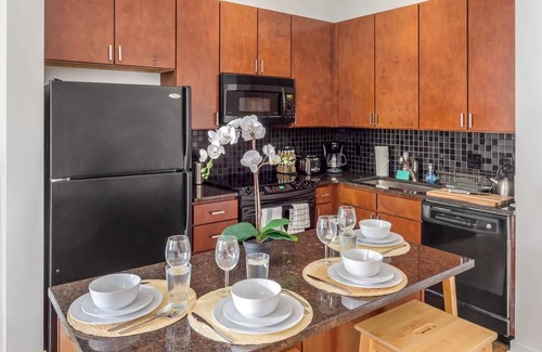 First Ward Apartment | Uptown 1st Ward | Minutes to Epicentre | Gym-Pool