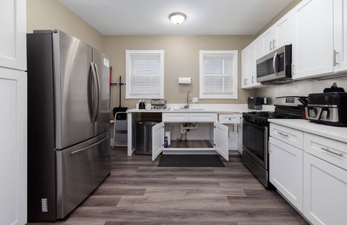 Hartford House | Urban 2-Story Remodeled Townhouse Retreat