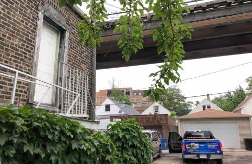 Little Village Apartment | Urban Coach Penthouse - Near Train, Medical District, and Downtown