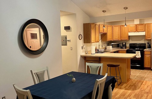 Taku - Campbell Apartment | Urban Comfort with Northern Charm
