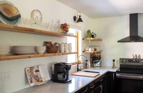 Decorah House | Urban Edge | Comfort & Fun: Large Game Room & Fitness Room