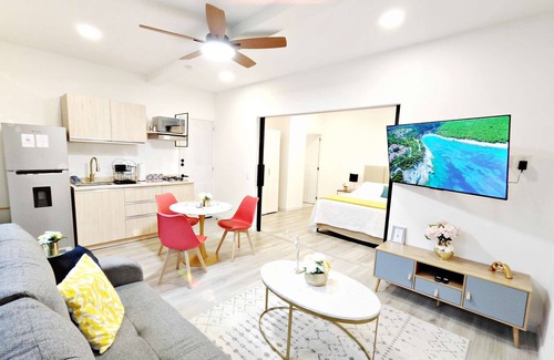 Granada Apartment | Urban Elegance: Spacious Loft with King Bed.