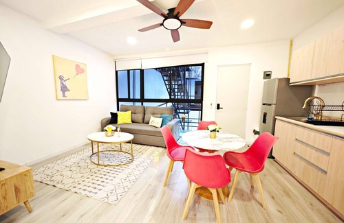 Granada Apartment | Urban Elegance: Spacious Loft with King Bed.
