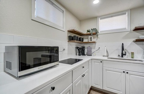 East Colorado Springs Apartment | Urban Reprieve King Bed BBQ Fire Pit & Views