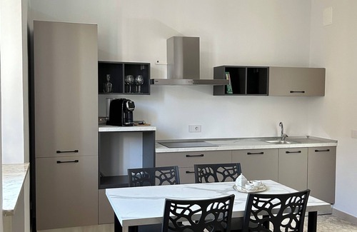 Lamezia Terme Apartment | Urban style meets cozy comfort