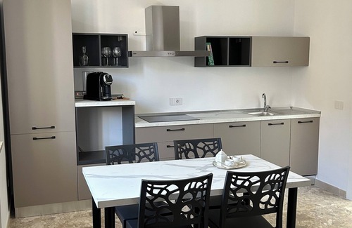 Lamezia Terme Apartment | Urban style meets cozy comfort