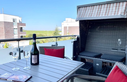 Wurster Nordseekuste Apartment | Vacation apartment "de Hahnpoten", 200 m to the sea, 4 persons, dike view