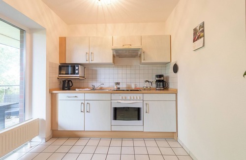 Wremen Apartment | Vacation apartment "Buhne 32" Lilli Marleen 3-32, peaceful and with a sunny balcony.