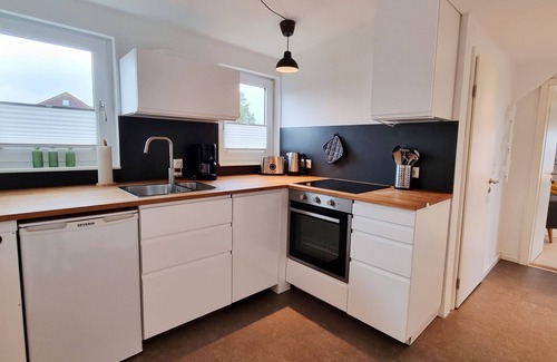 Kalifornien Apartment | Vacation apartment "Achtern Diek 3" 1st row on the Baltic Sea coast, dog-friendly