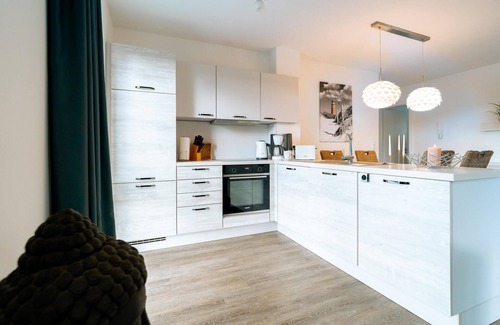 Schillig Apartment | Vacation apartment for 4 people with sauna and view of the Graft on the North Sea coast