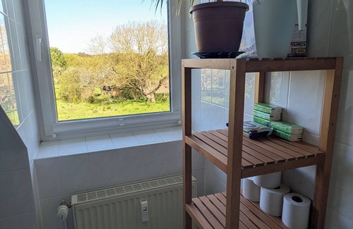 Carpin Apartment | Vacation apartment in a cozy farmhouse by the bathing lake with large garden and sauna