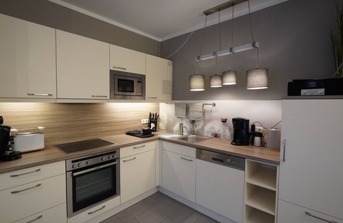 Serrahn Apartment | Vacation apartment "Kranich" on Lake Krakow with terrace and playroom