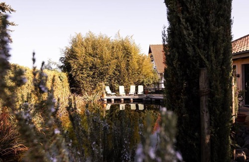 Kindenheim Apartment | Vacation apartment "Punica" - "Living in the garden of the senses"