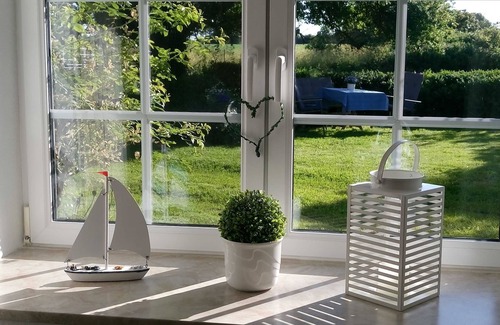 Oeversee Apartment | Vacation apartment Thomsen: Holiday relaxation with a large garden - FeWo Thomsen