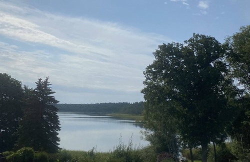 Murchin House | Vacation apartment/vacation bungalow/vacation home with lake view off Usedom