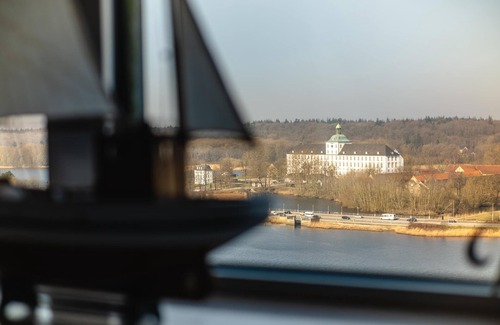 Schleswig-Flensburg District Apartment | Vacation apartment "Wikingturm Etage 14 Nr. 1" with a view of Schleswig and the Schlei