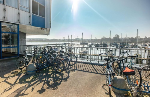 Schleswig-Flensburg District Apartment | Vacation apartment "Wikingturm Etage 14 Nr. 1" with a view of Schleswig and the Schlei