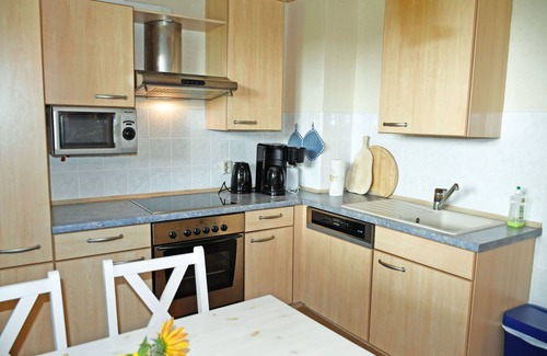 Ralswiek Apartment | Vacation apartment with sitting area in the garden on the Bodden in Ralswiek - Holiday apartment with