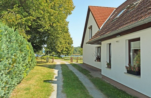 Ralswiek Apartment | Vacation apartment with sitting area in the garden on the Bodden in Ralswiek - Holiday apartment with