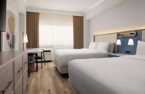 White Plains Hotel | Vacation At Its Finest! 4 Convenient Units, Free Airport Shuttle, Pet-Friendly