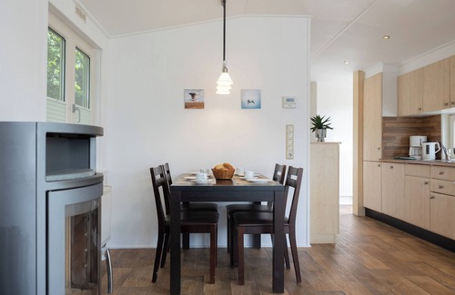 Dorumer Neufeld House | Vacation bungalow Mellumplate 12 with sun terrace and ground floor