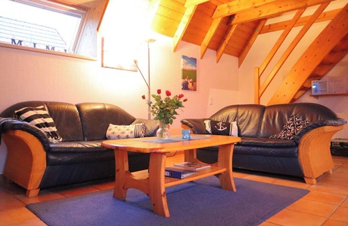 Dorumer Neufeld House | Vacation home "MoinMoin" - Experience maritime charm on the Wurster North Sea coast!